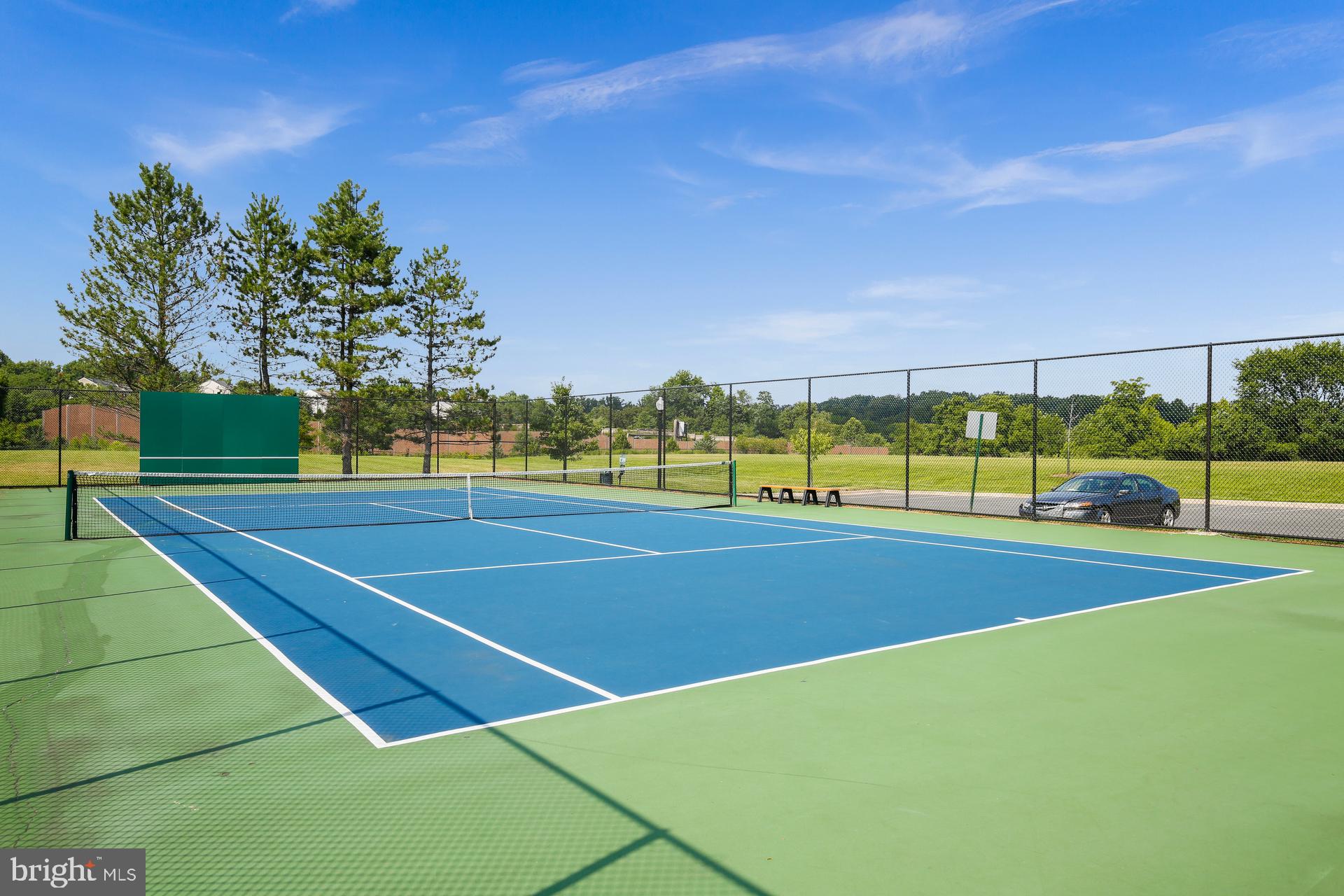 14901 Running Ridge Lane Silver Spring, MD 20906 - Photo 48 of 49 a view of an outdoor space and tennis court