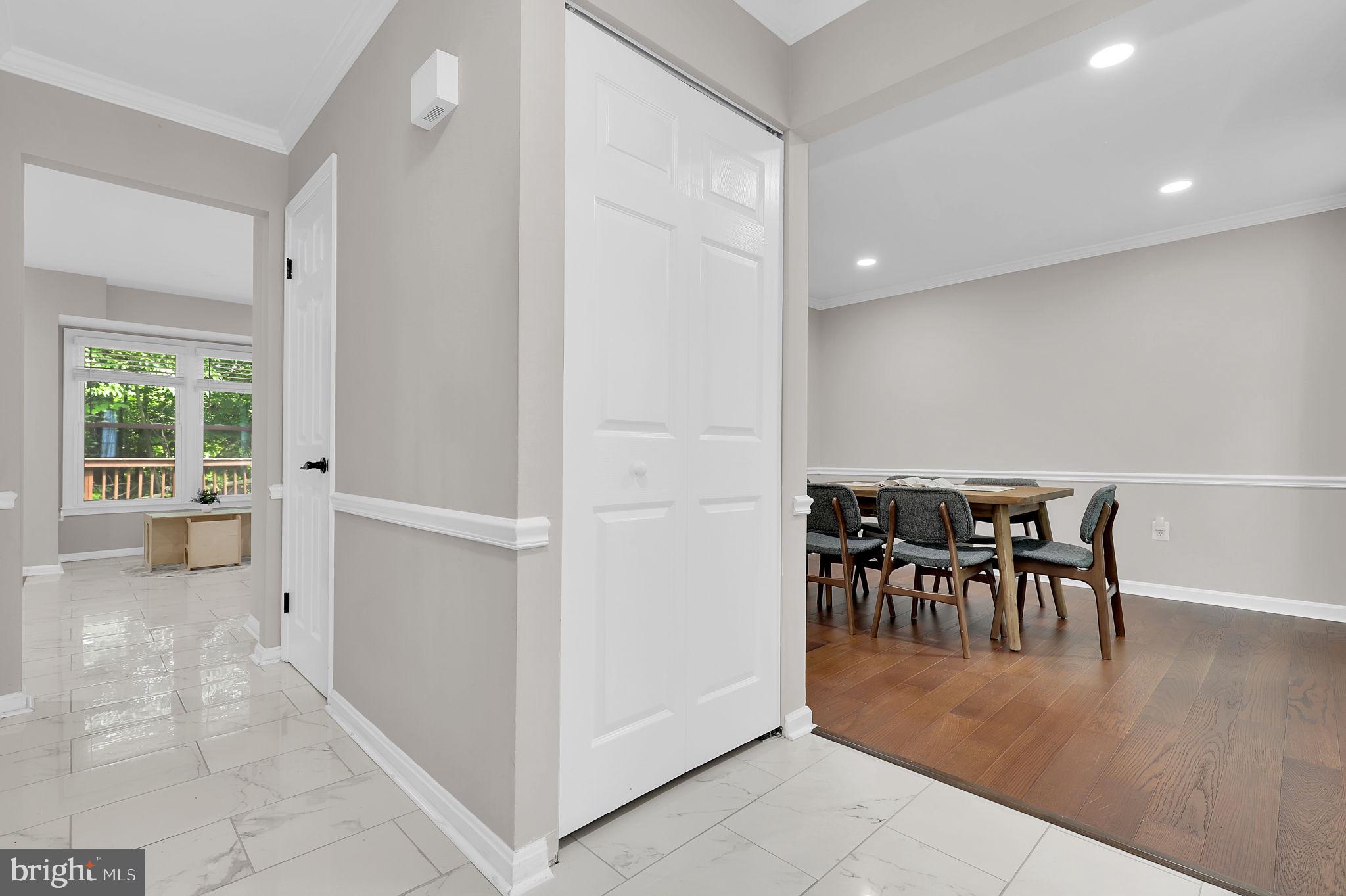 14901 Running Ridge Lane Silver Spring, MD 20906 - Photo 7 of 49 a view of a dining room with furniture and wooden floor