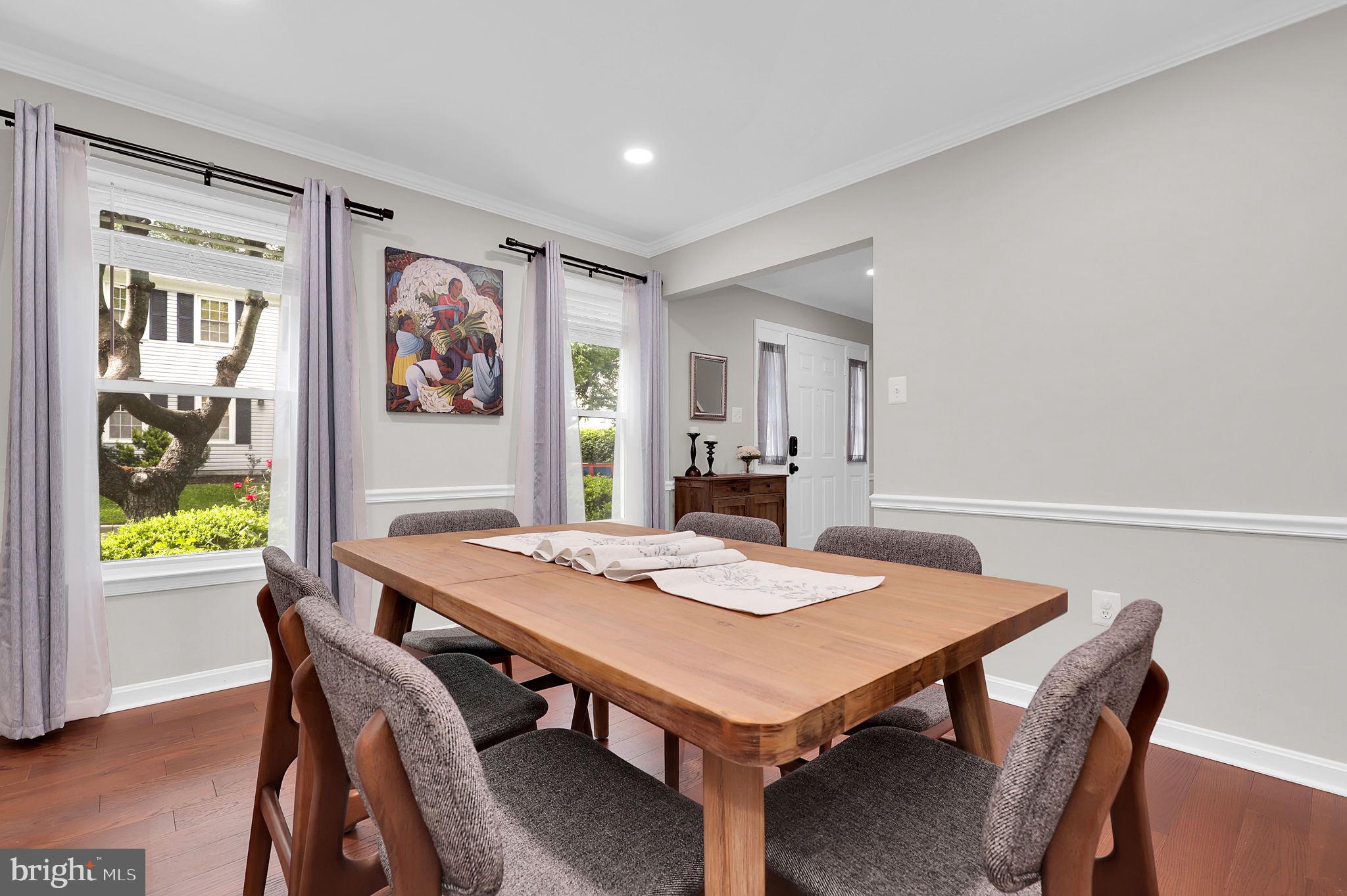 14901 Running Ridge Lane Silver Spring, MD 20906 - Photo 9 of 49 a view of a dining room with furniture window and wooden floor