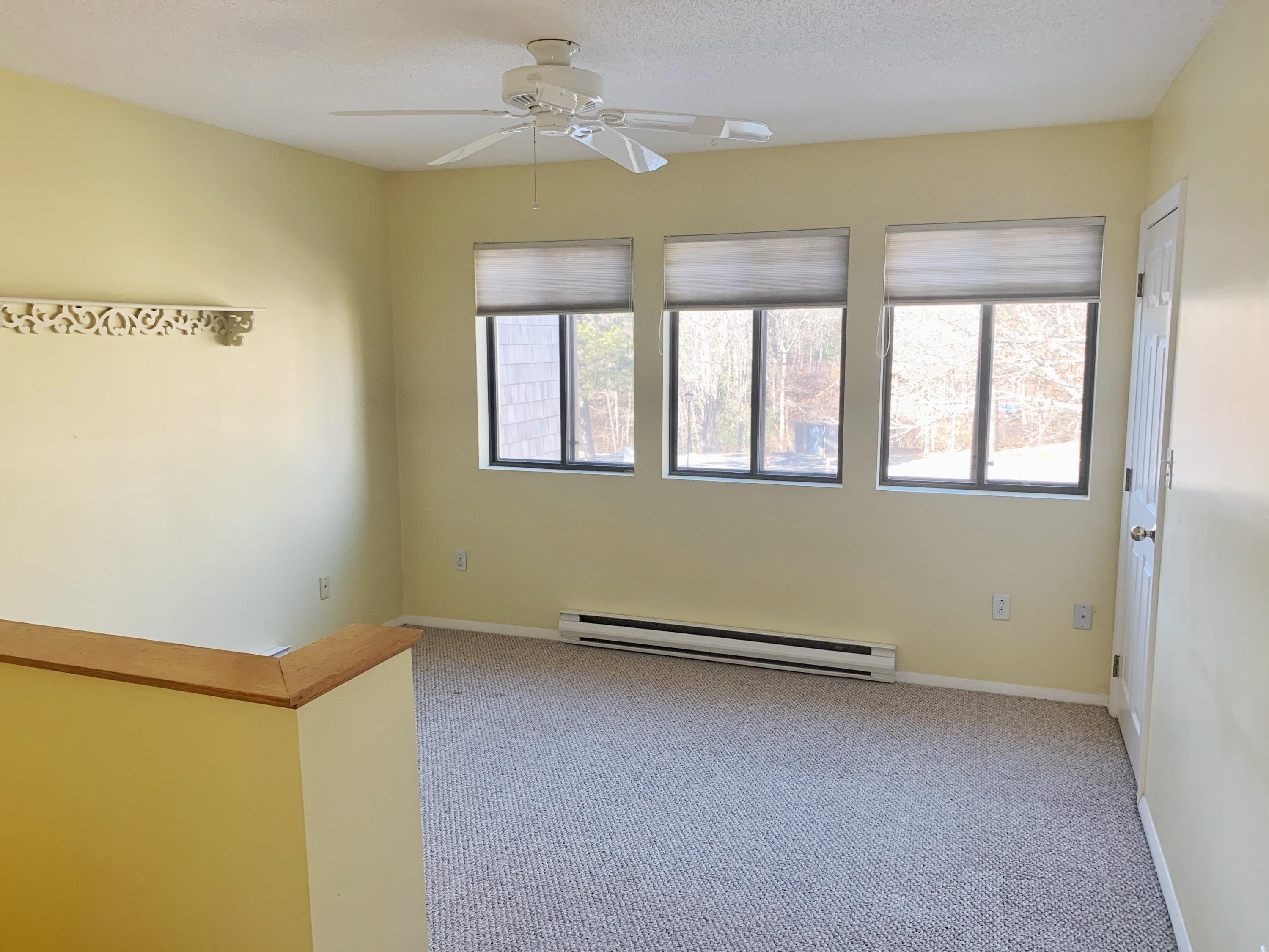 80 Round House Road Bourne, MA 02532 - Photo 16 of 25 a view of an empty room with a window