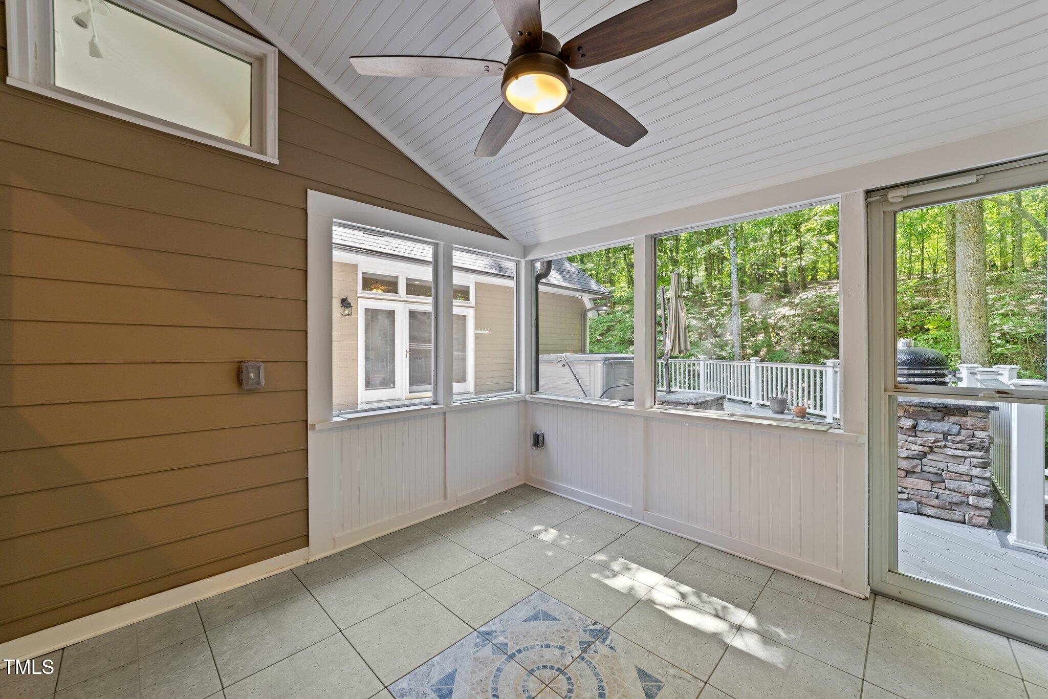 11425 Horseman's Trail Raleigh, NC 27613 - Photo 11 of 64 a kitchen with a stove and a chandelier