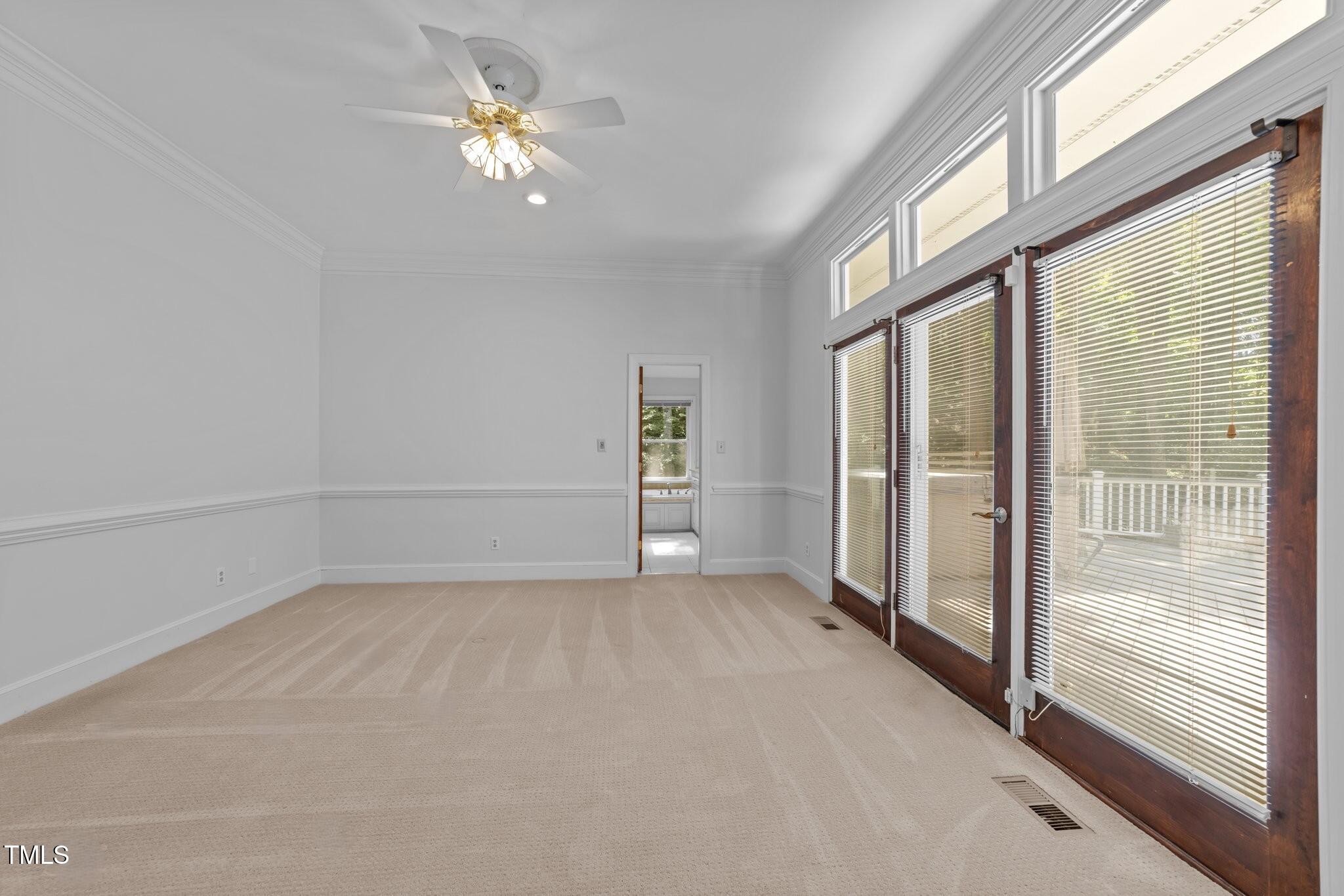 11425 Horseman's Trail Raleigh, NC 27613 - Photo 19 of 64 a view of an empty room with a window
