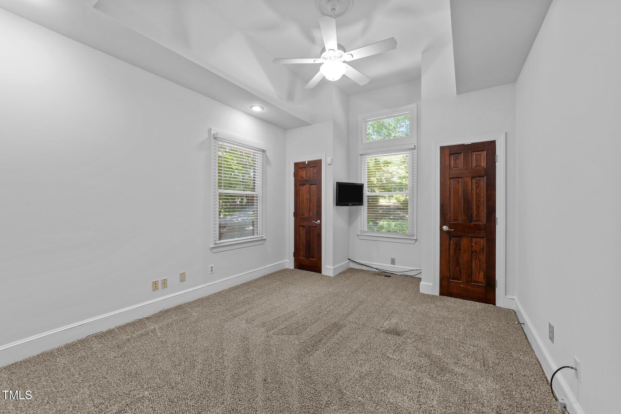 11425 Horseman's Trail Raleigh, NC 27613 - Photo 25 of 64 a view of an empty room with a window