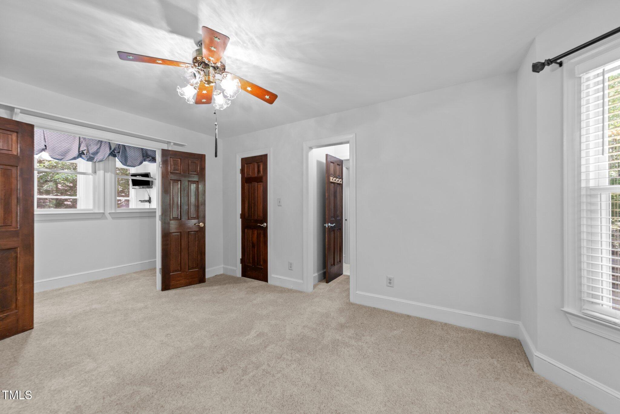 11425 Horseman's Trail Raleigh, NC 27613 - Photo 34 of 64 a view of an empty room with a window