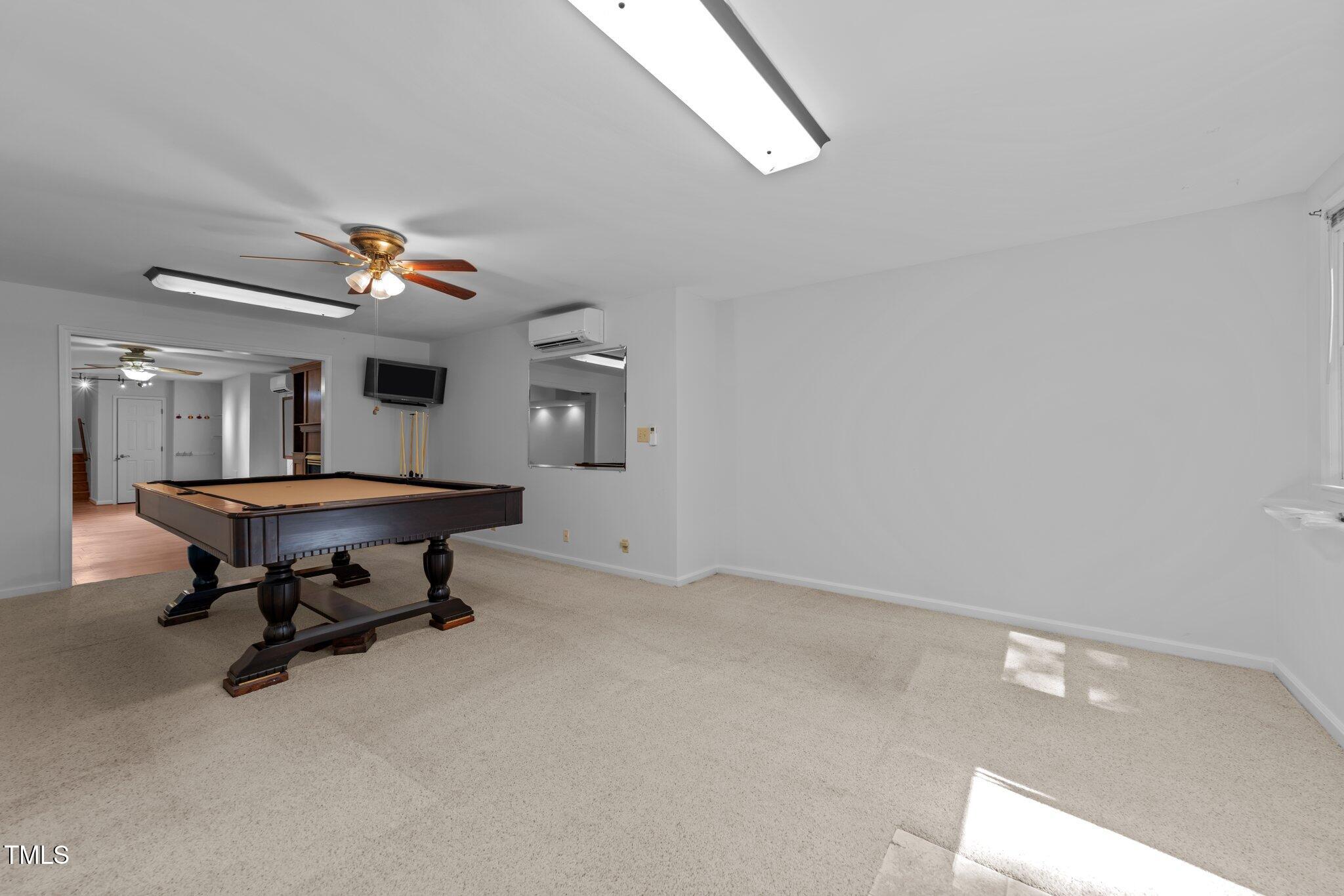 11425 Horseman's Trail Raleigh, NC 27613 - Photo 43 of 64 a view of a livingroom with furniture and a window