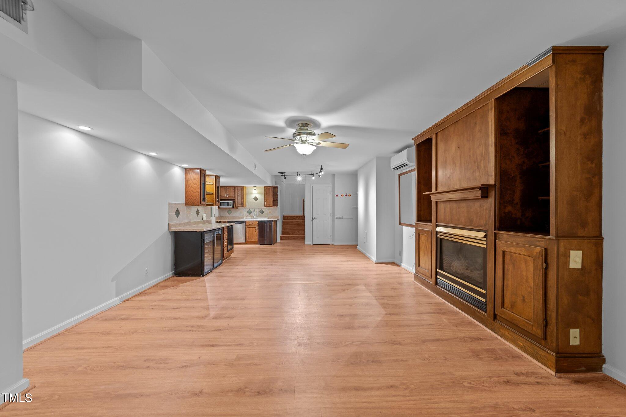 11425 Horseman's Trail Raleigh, NC 27613 - Photo 44 of 64 a kitchen with stainless steel appliances kitchen island a refrigerator and a sink