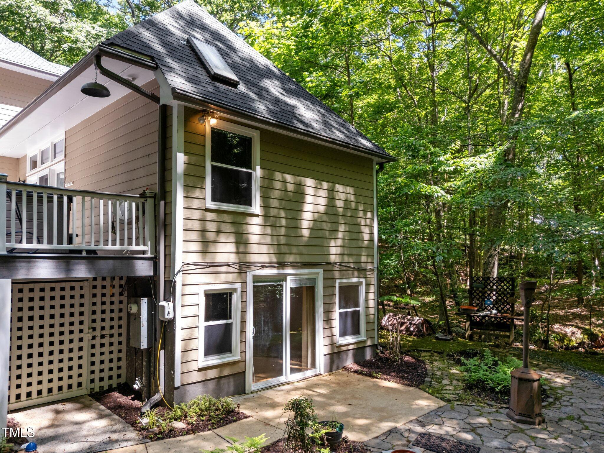 11425 Horseman's Trail Raleigh, NC 27613 - Photo 54 of 64 a front view of a house with a garage