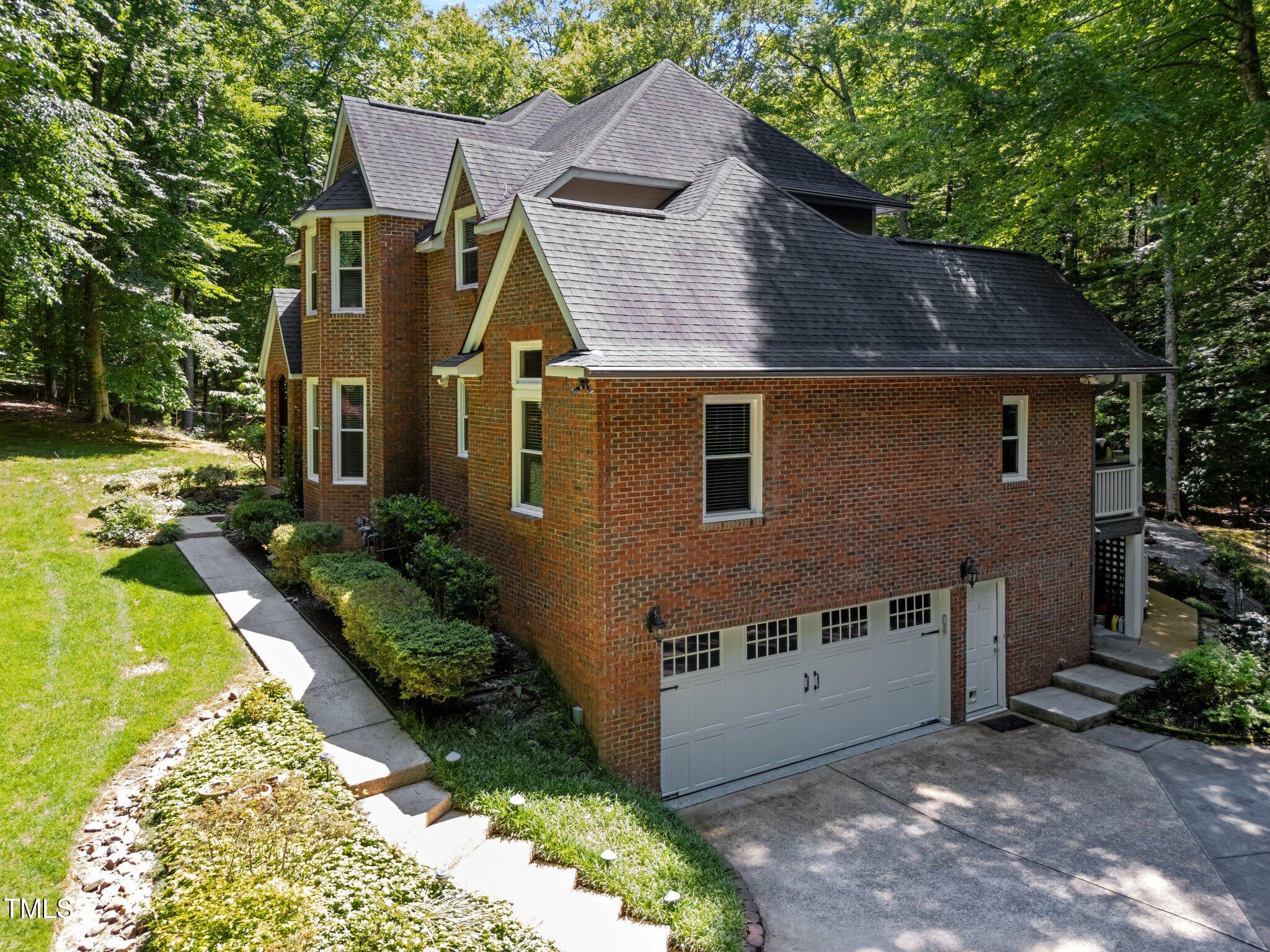 11425 Horseman's Trail Raleigh, NC 27613 - Photo 57 of 64 a aerial view of a house with a yard