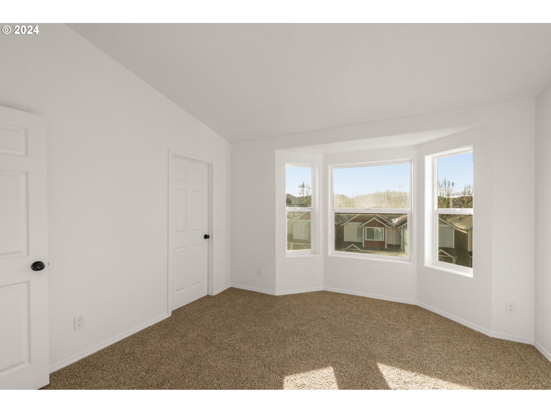 2501 Northwest 1st Drive Gresham, OR 97030 - Photo 15 of 27 a view of an empty room with a window