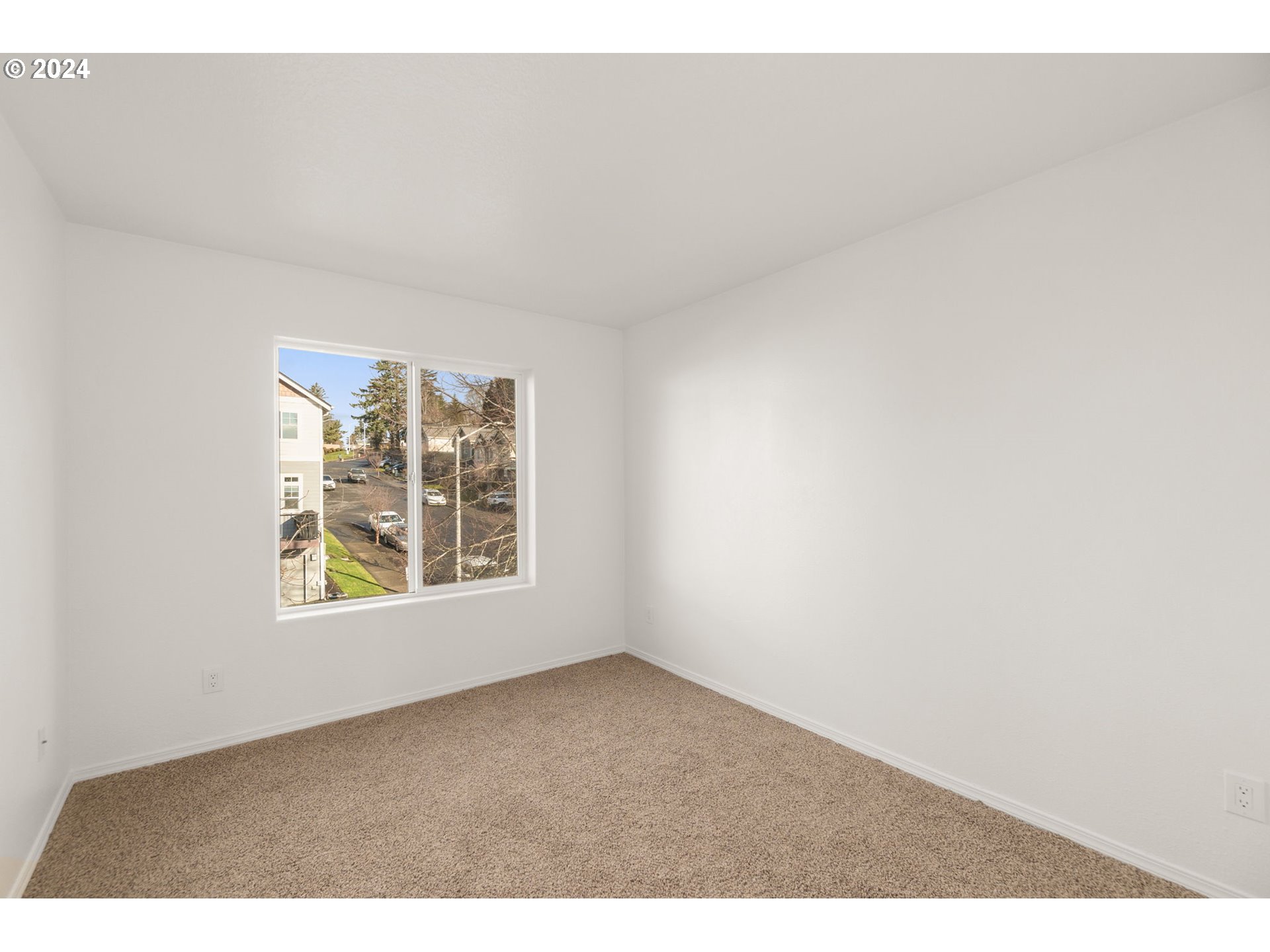 2501 Northwest 1st Drive Gresham, OR 97030 - Photo 20 of 27 a view of an empty room with a window
