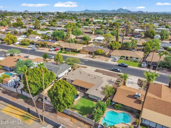 a picture of a bench in a white wall