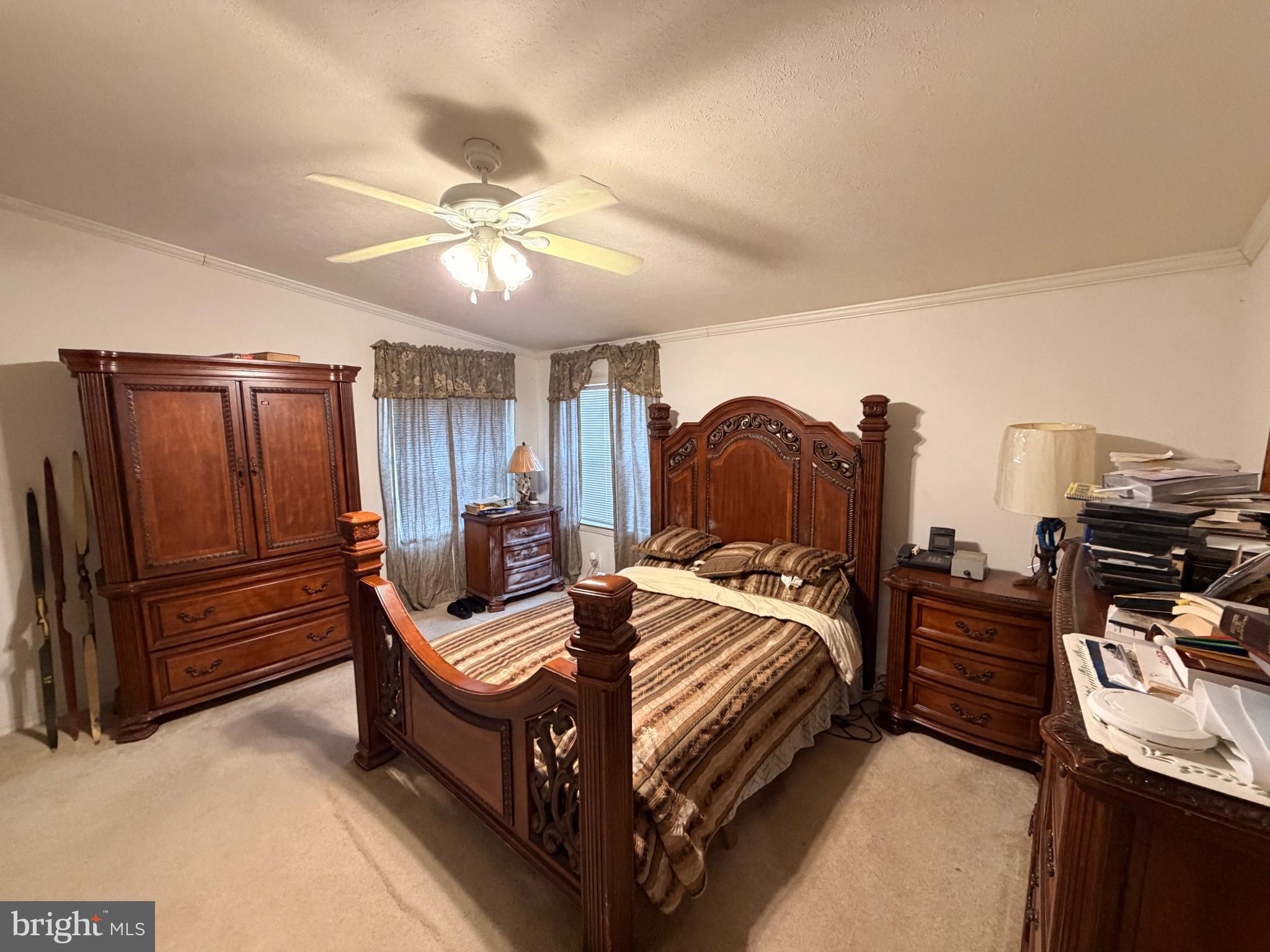 6565 Cabin Ridge Road Hurlock, MD 21643 - Photo 12 of 14 a bedroom with a bed and furniture