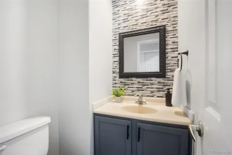 a bathroom with a sink and a toilet