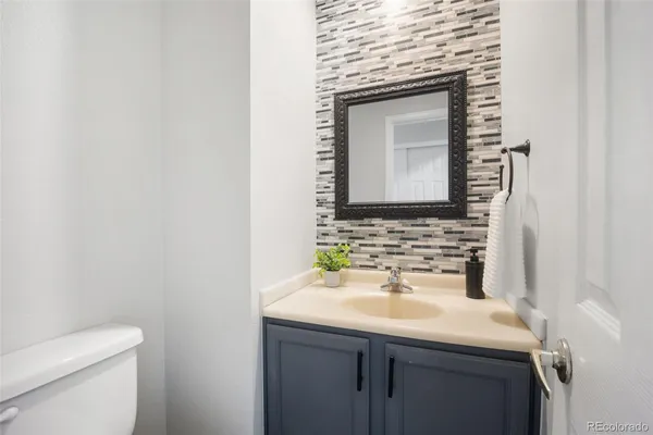 a bathroom with a sink and a toilet