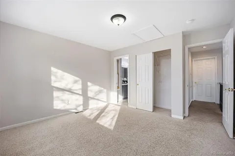 a view of empty room with windows