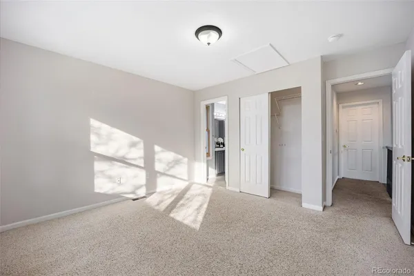 a view of empty room with windows
