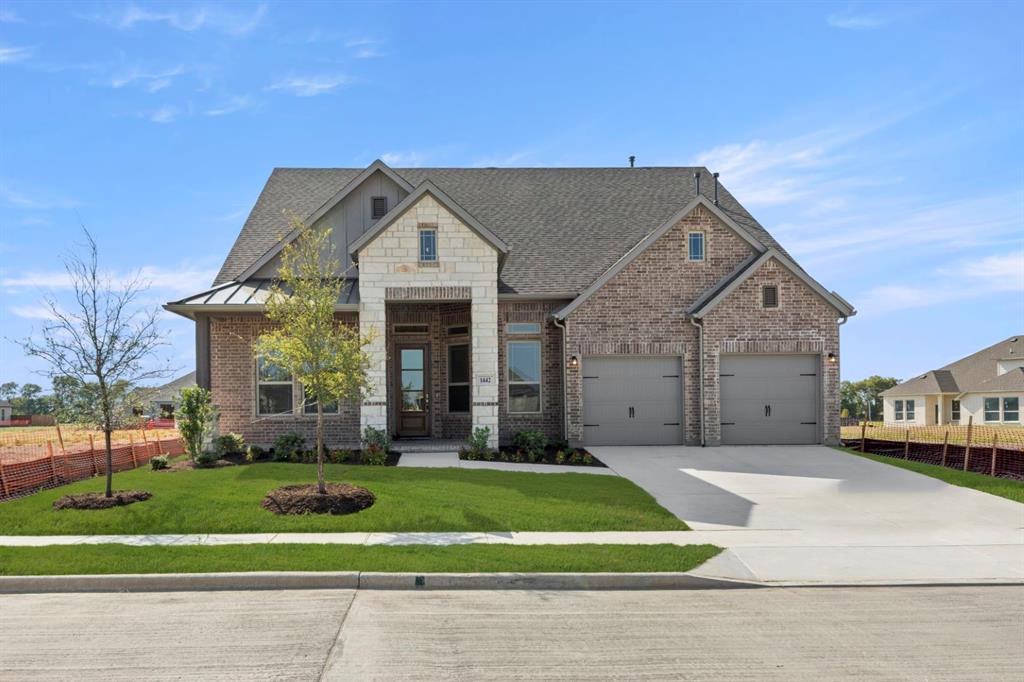 1442 Canadian Lane Van Alstyne, TX 75495 - Photo 1 of 27 a front view of a house with a yard