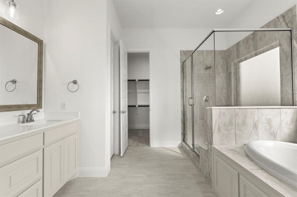 1442 Canadian Lane Van Alstyne, TX 75495 - Photo 15 of 27 a bathroom with a double vanity sink mirror and shower