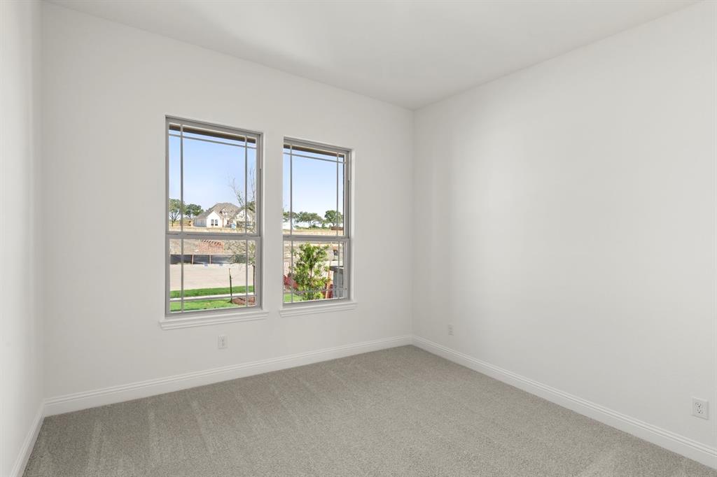 1442 Canadian Lane Van Alstyne, TX 75495 - Photo 19 of 27 an empty room with a window