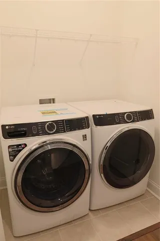 a utility room with dryer and washer