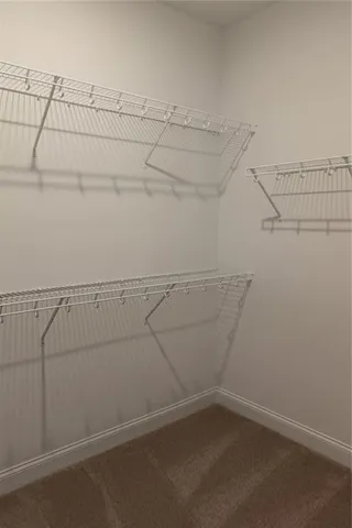 a view of a room with racks on the wall