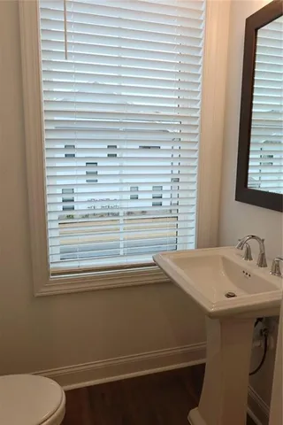 a bathroom with a sink and a toilet