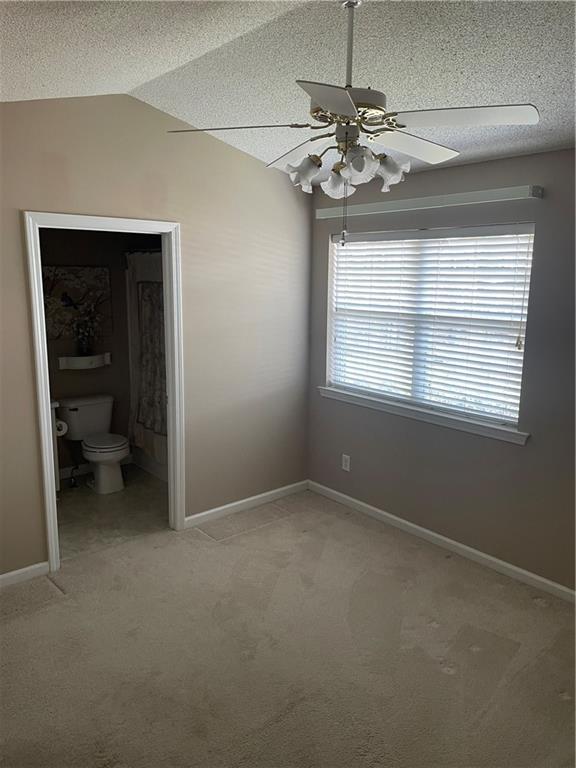 2849 Florence Drive Gainesville, GA 30504 - Photo 11 of 22 a view of a livingroom with a chandelier fan and a window