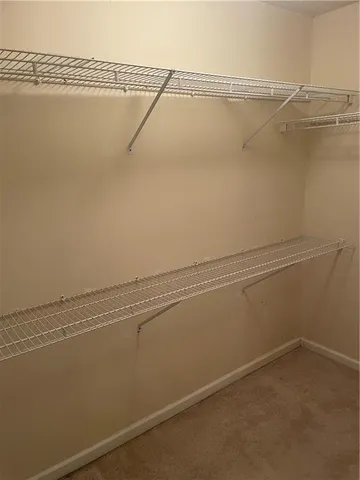 a view of a room with racks on the wall