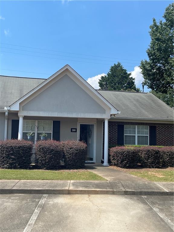 2849 Florence Drive Gainesville, GA 30504 - Photo 2 of 22 a front view of a house with a yard