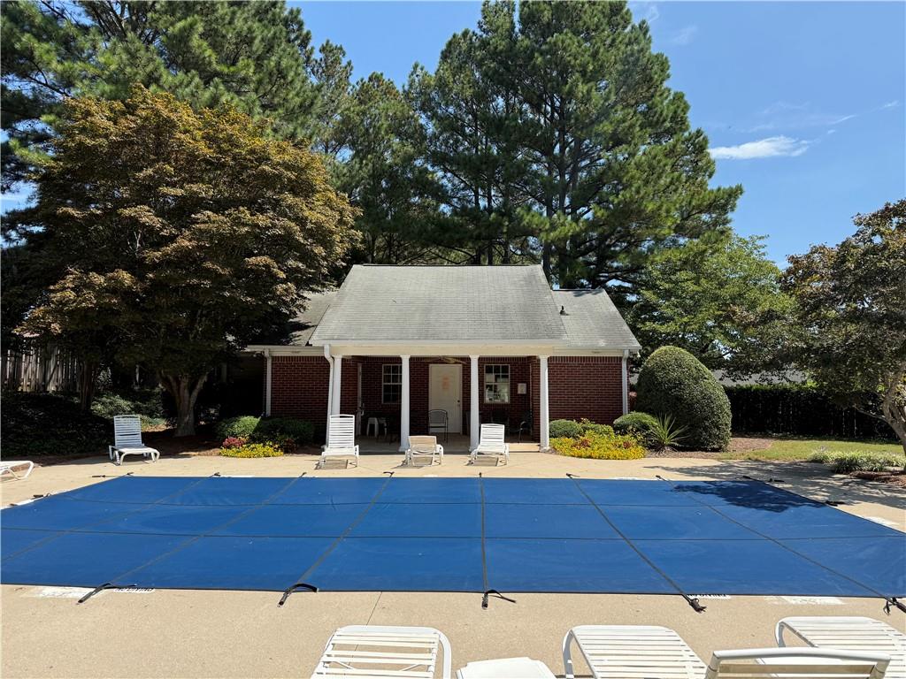 2849 Florence Drive Gainesville, GA 30504 - Photo 21 of 22 a view of swimming pool with deck and a garden