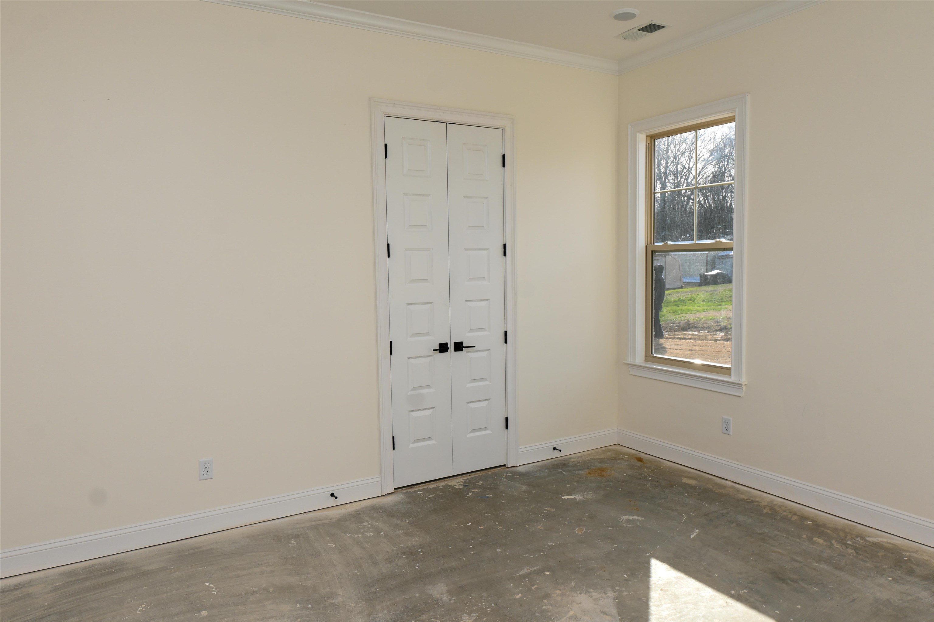 2939 Brighton-Clopton Road Brighton, TN 38011 - Photo 19 of 23 Unfurnished room with unfinished concrete flooring and ornamental molding