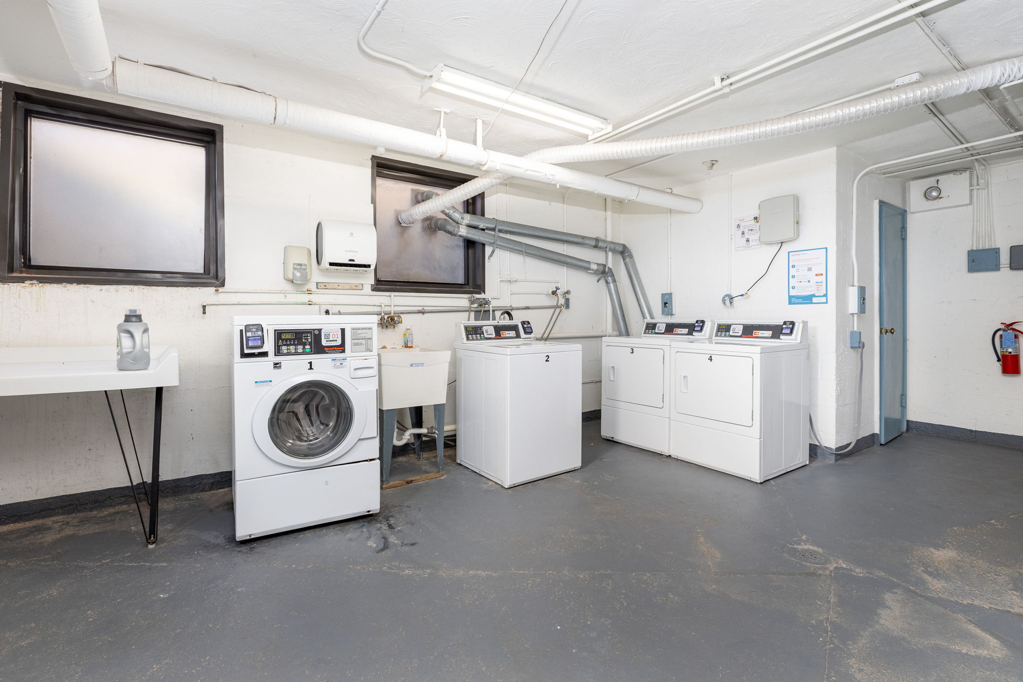 869 Farmington Avenue, Unit 305 West Hartford, CT 06119 - Photo 27 of 30 a utility room with dryer and washer