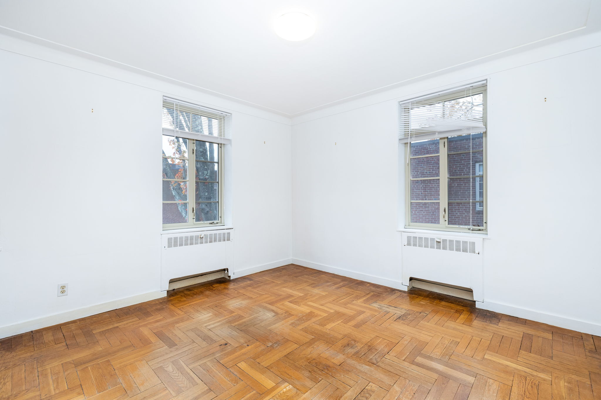 869 Farmington Avenue, Unit 305 West Hartford, CT 06119 - Photo 9 of 30 an empty room with windows