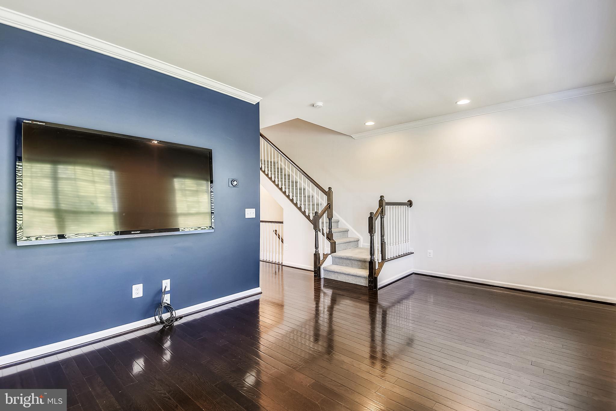 44021 Eastgate View Drive Chantilly, VA 20152 - Photo 11 of 54 Living Room - 70" Sharp TV Conveys