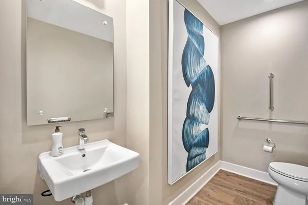 a view of a storage and utility room with washer and dryer
