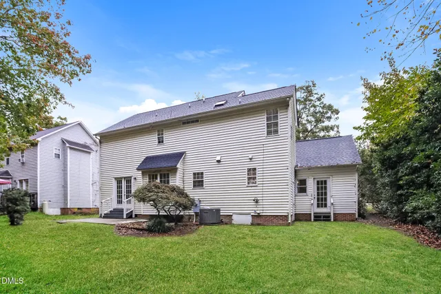 a bathroom with a bathtub and a toilet