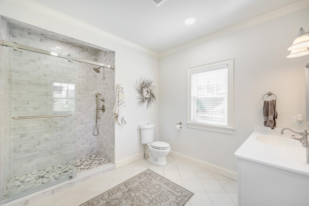 55 Cove Road Eastham, MA 02642 - Photo 26 of 42 a bathroom with a sink toilet and shower