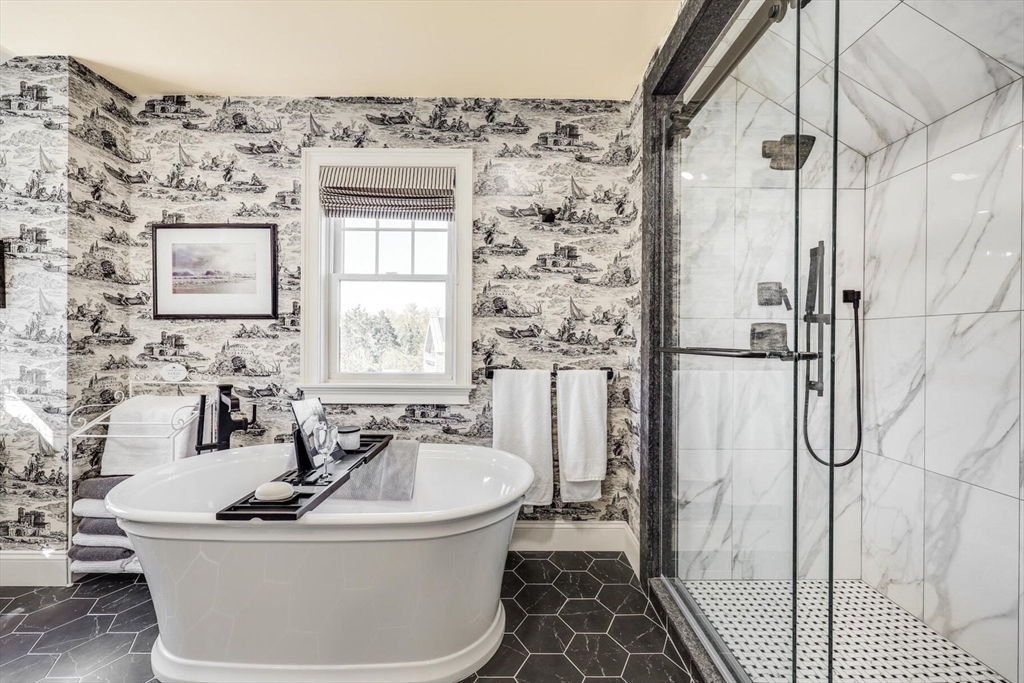 55 Cove Road Eastham, MA 02642 - Photo 33 of 42 a bath tub sitting next to a bathroom sink