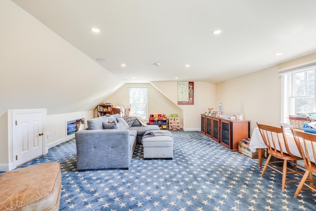 55 Cove Road Eastham, MA 02642 - Photo 41 of 42 a living room with furniture and a table