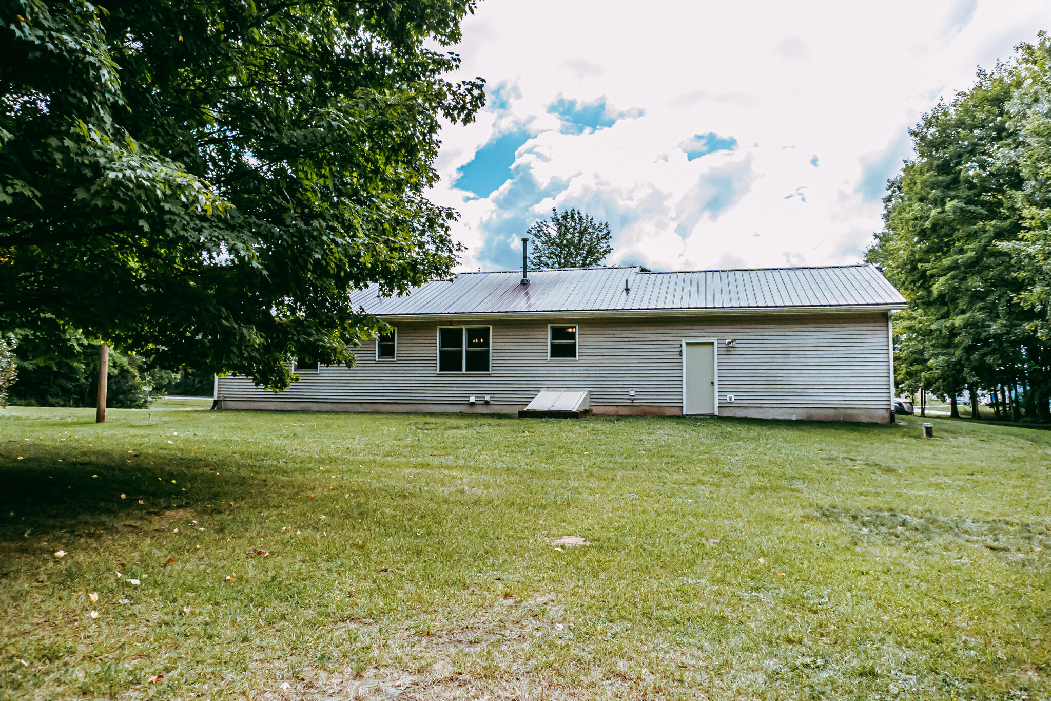 6545 18 Mile Road Northeast Cedar Springs, MI 49319 - Photo 20 of 33 18 mile back of home