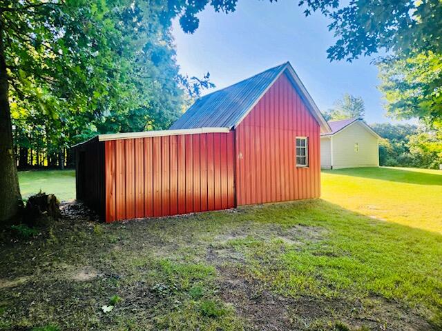 6545 18 Mile Road Northeast Cedar Springs, MI 49319 - Photo 27 of 33 6545 18 MILE BARN SIDE
