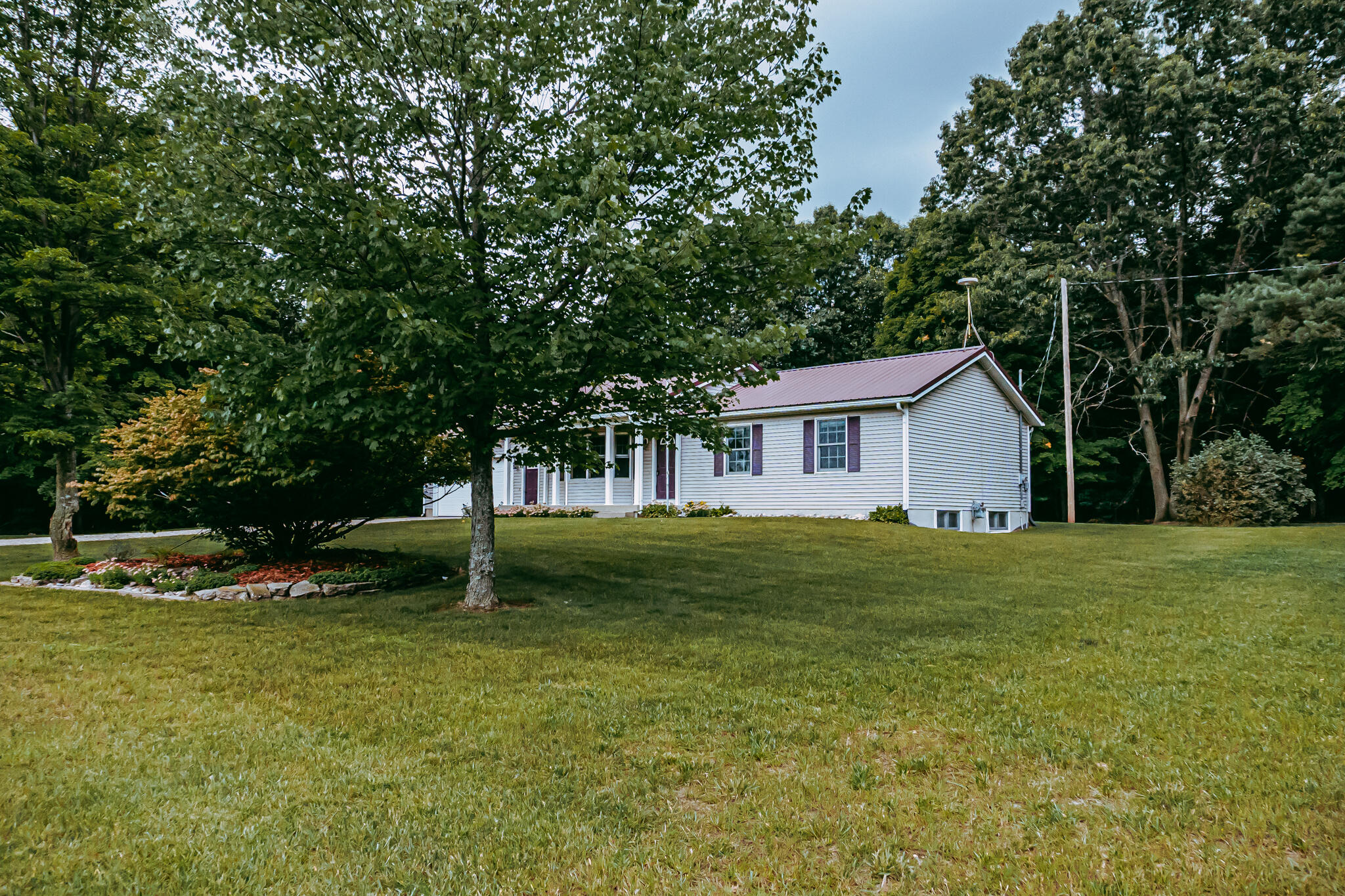 6545 18 Mile Road Northeast Cedar Springs, MI 49319 - Photo 3 of 33 18 mile side front