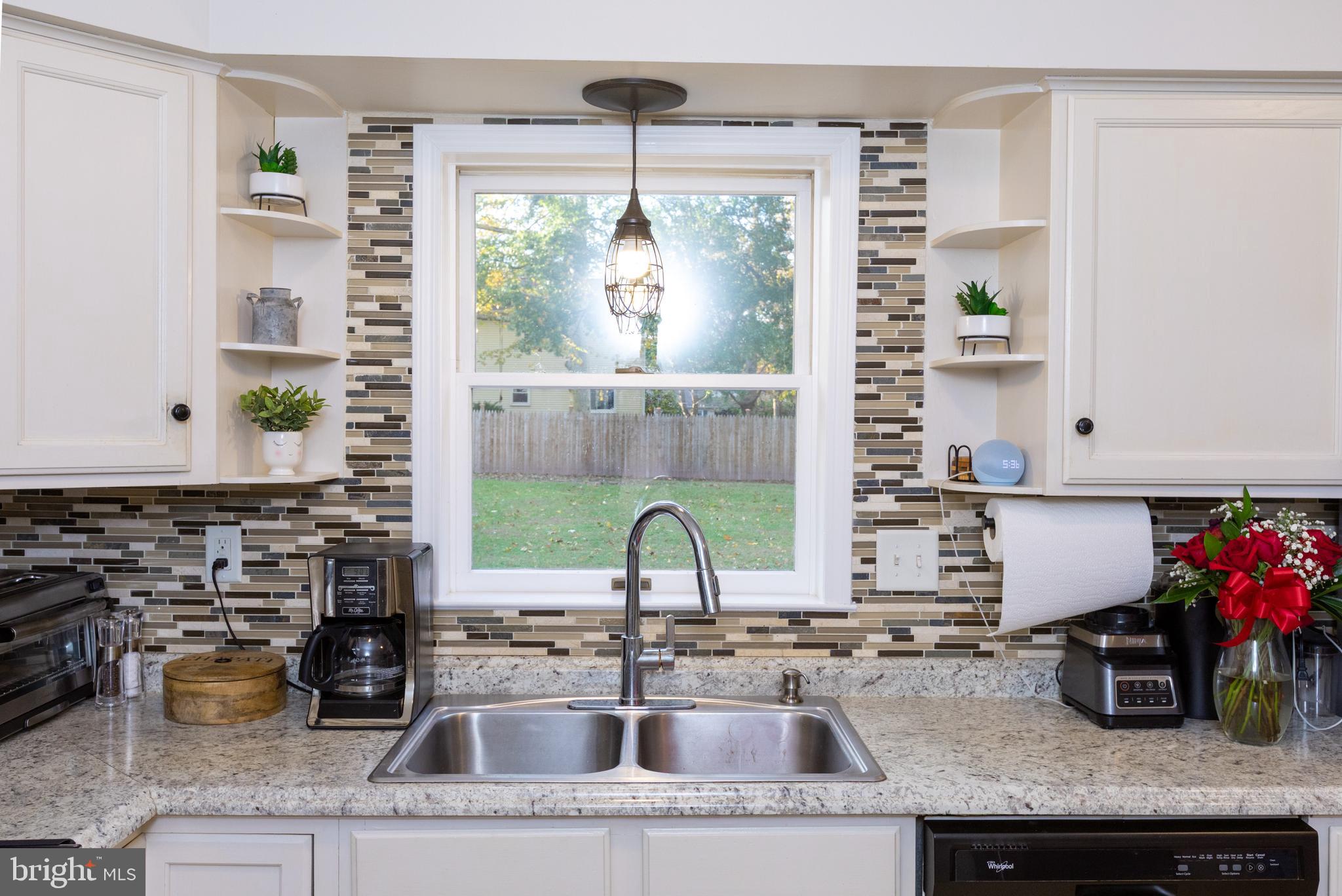 1315 Deer Run Road Hatfield, PA 19440 - Photo 12 of 35 a kitchen with a granite countertop sink and window