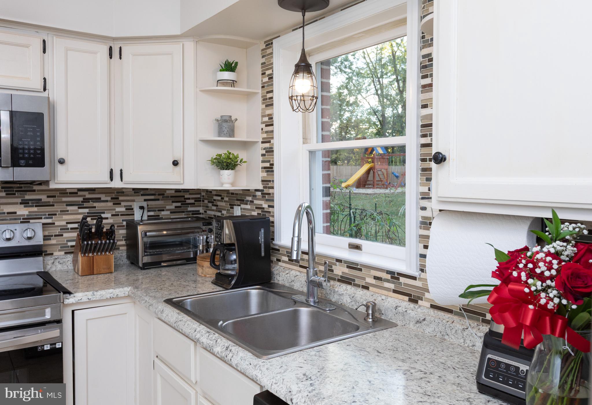 1315 Deer Run Road Hatfield, PA 19440 - Photo 13 of 35 a kitchen with a sink and a stove