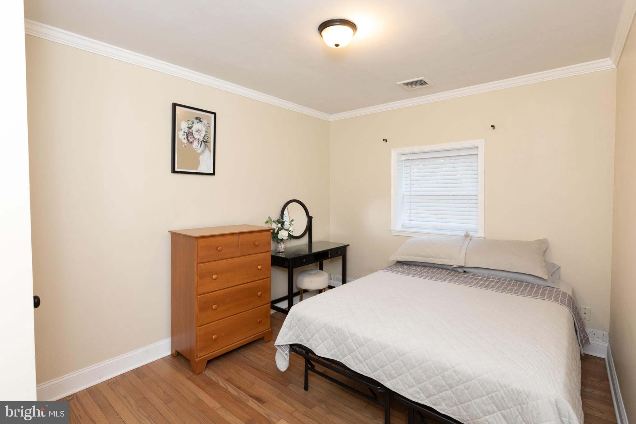 1315 Deer Run Road Hatfield, PA 19440 - Photo 19 of 35 a bedroom with a bed and a window