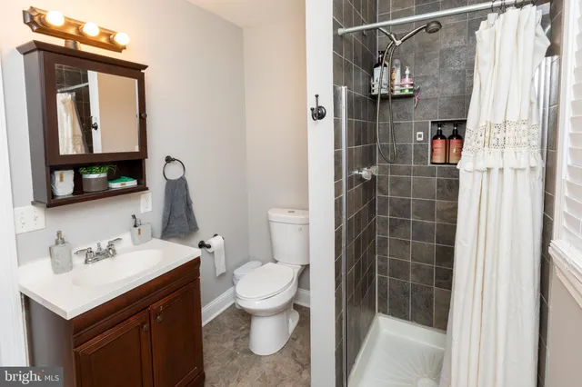 a view of a utility room with a sink