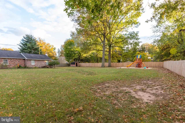 a view of outdoor space with slide and entertaining space