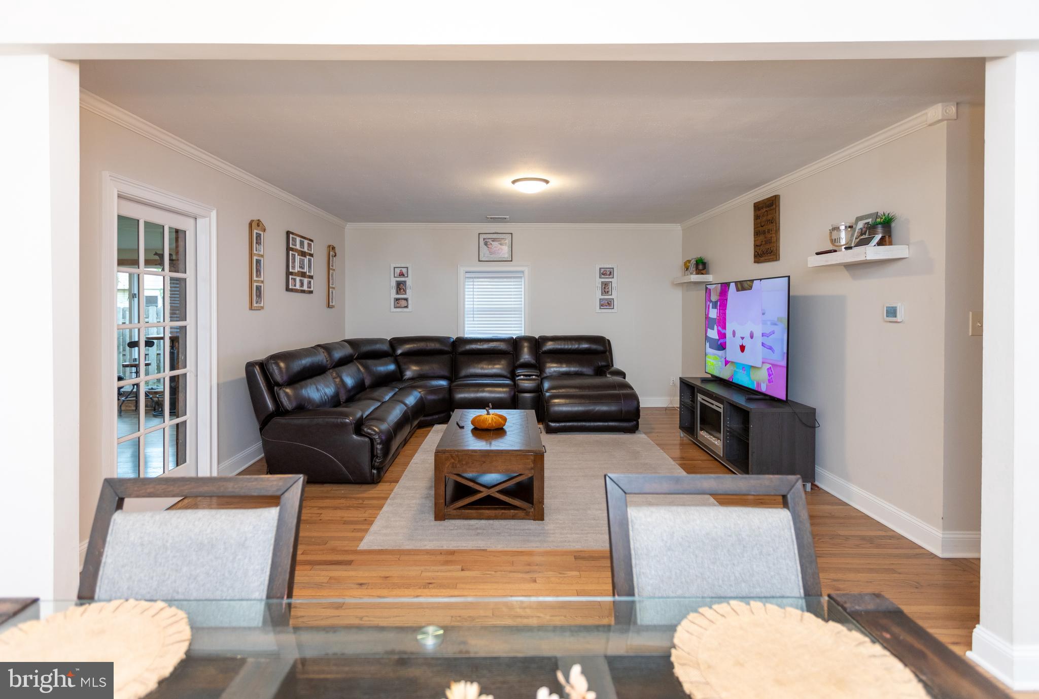 1315 Deer Run Road Hatfield, PA 19440 - Photo 9 of 35 a living room with furniture and a flat screen tv