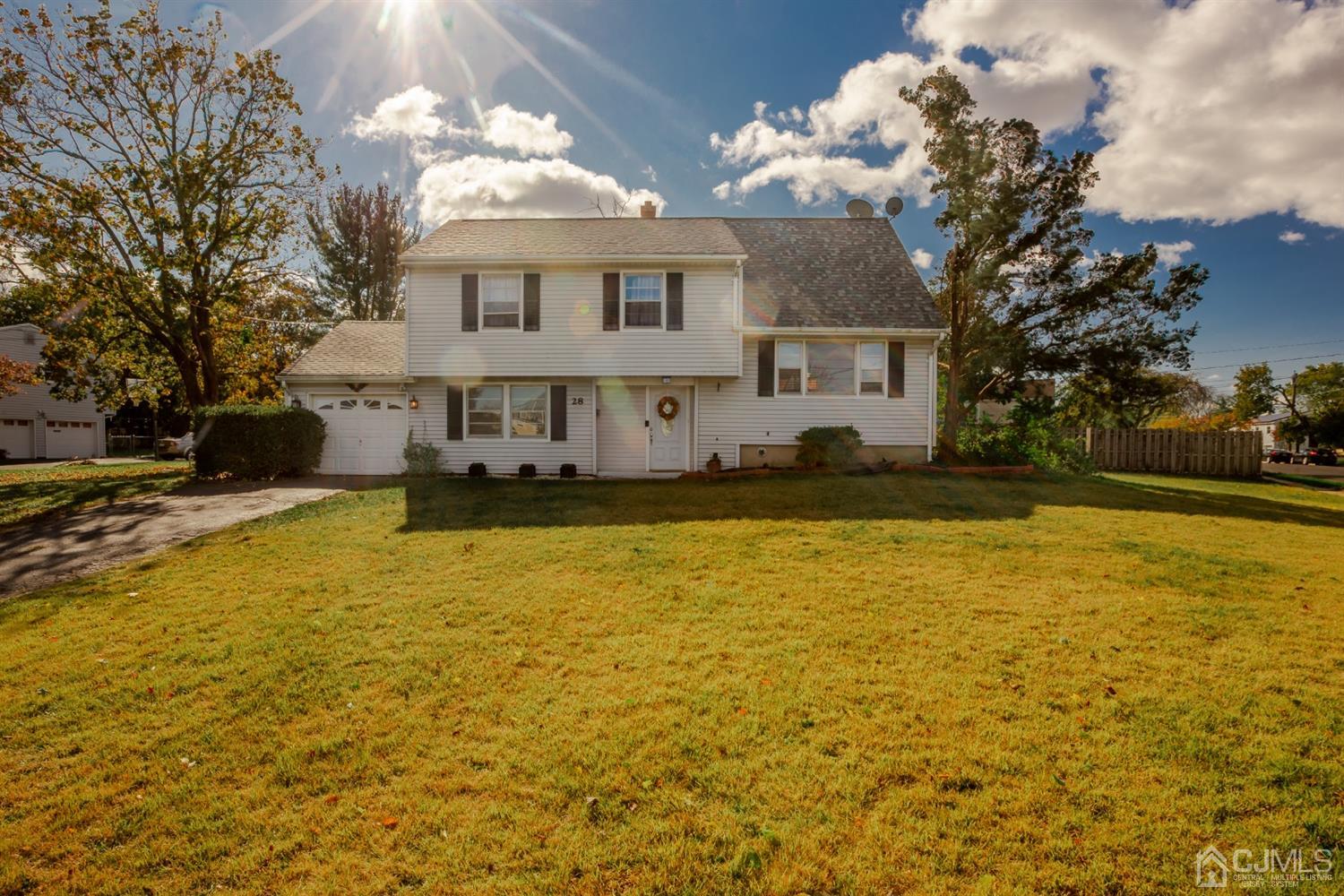 28 Atlantic Road Somerset, NJ 08873 - Photo 1 of 18 a view of a swimming pool with an outdoor space
