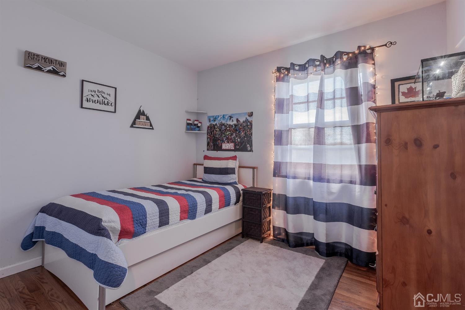 28 Atlantic Road Somerset, NJ 08873 - Photo 12 of 18 a bedroom with a bed and painting on the wall
